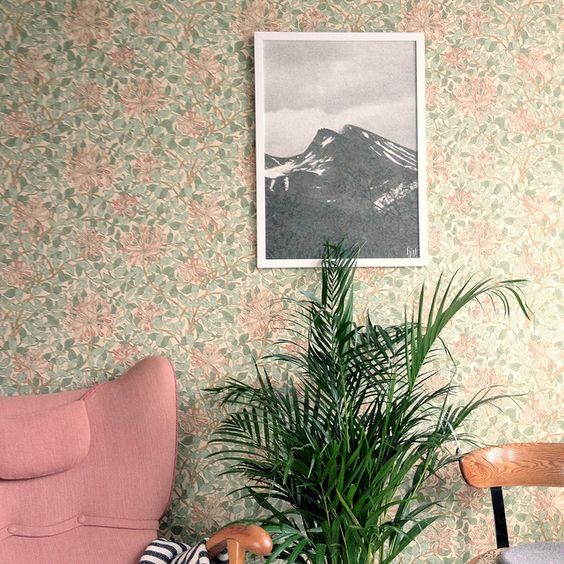 floral wallpaper in calm green and pink for a living room
