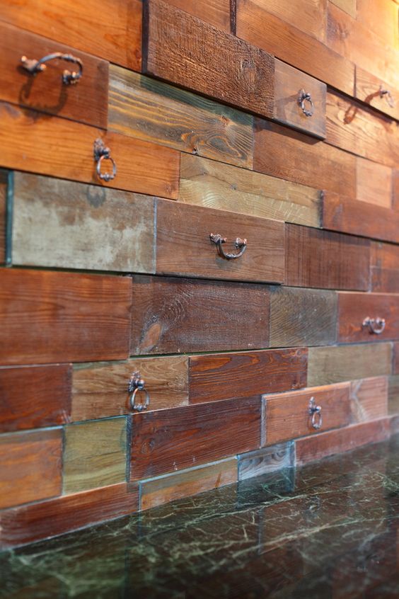 Wall texture from old drawer fronts is a unique solution that may be DIYed