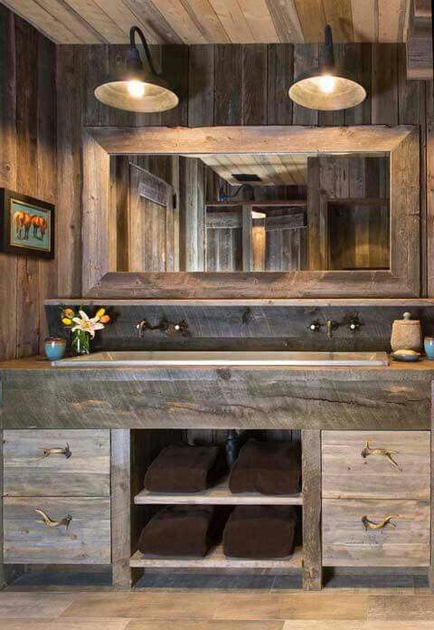 reclaimed rough wood vanity with drawers and open shelves