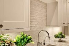 10 white cabinets look great with such stone-inspired grey countertops