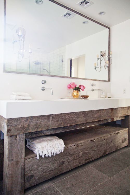 reclaimed wood bathroom vanity with an open shelf and drawers
