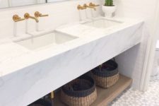 13 an upper marble surface and a lower wooden shelf with baskets