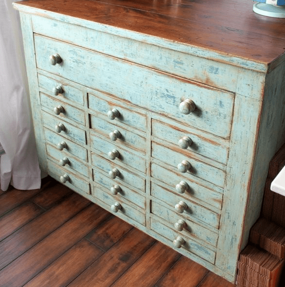 shabby apothecary style dresser with lots of small drawers for a bedroom