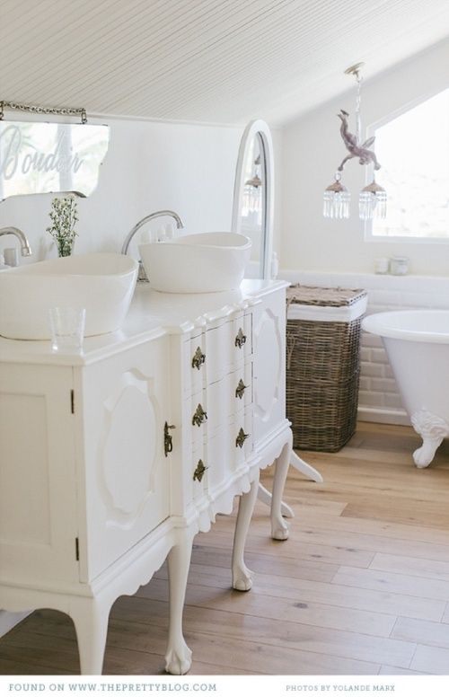 exquisite white French dresser used as a bathroom vanity