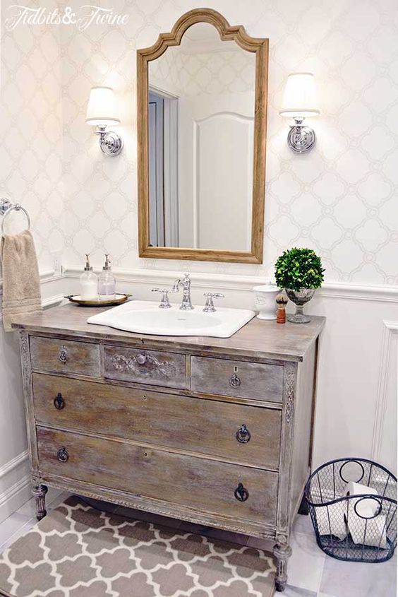 vintage reclaimed wooden sideboard repurposed into a bathroom vanity