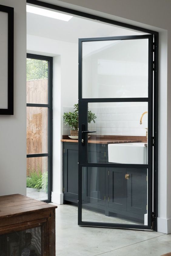 black metal frame glass doors for the kitchen nook