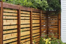 15 simple stained horizontal wooden fence will match any backyard decor