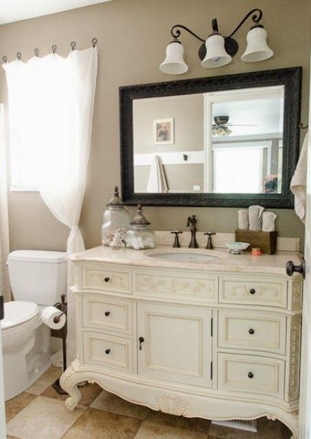 refined white dresser into a bathroom vanity