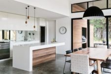 16 sleek white minimalist kitchen and a modern diner connected with colors and pendant lamps