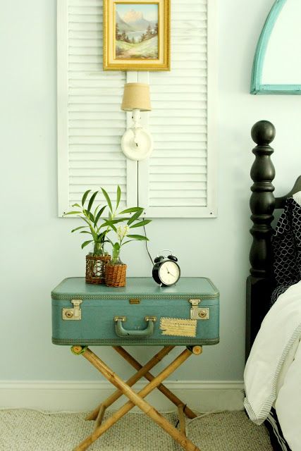 A vintage suitcase can become a great nightstand in your bedroom.