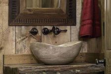 17 rough wood countertop and a stone sink make a cool combo