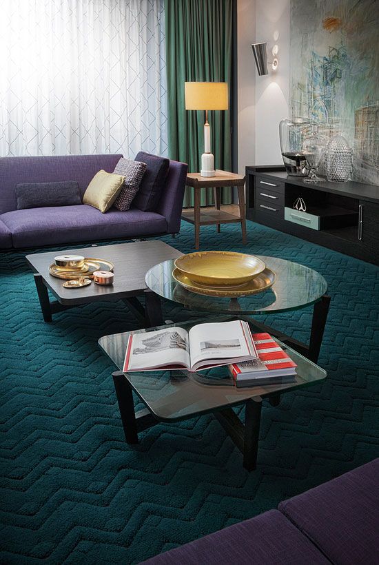 teal, greens and purple upholstery look bold and harmonious
