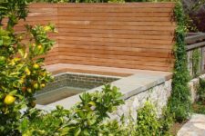 18 wooden privacy fence surrounding a spa outdoors