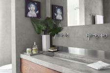 20 a wooden vanity with a concrete countertop for a modern laconic bathroom