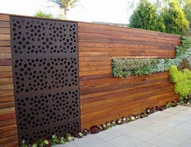 modern wooden fence with a succulent part will become a cool decor feature