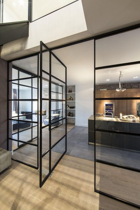 if you have an industrial space, such black framed doors will be to the point