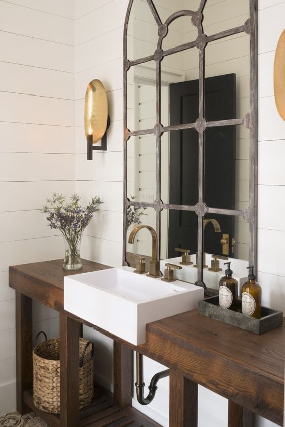 dark stained open wooden vanity with an industrial feel