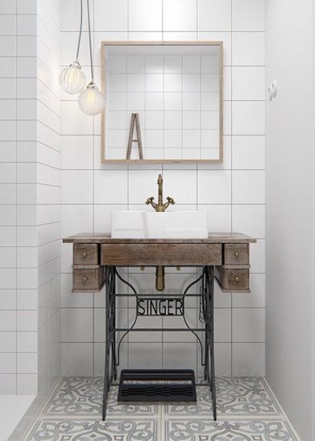 Singer sewing machine stand as bathroom sink basin is a unique and eye-catchy idea