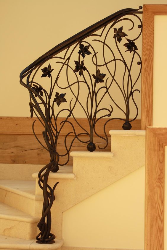 art nouveau worught iron railing looks just stunning