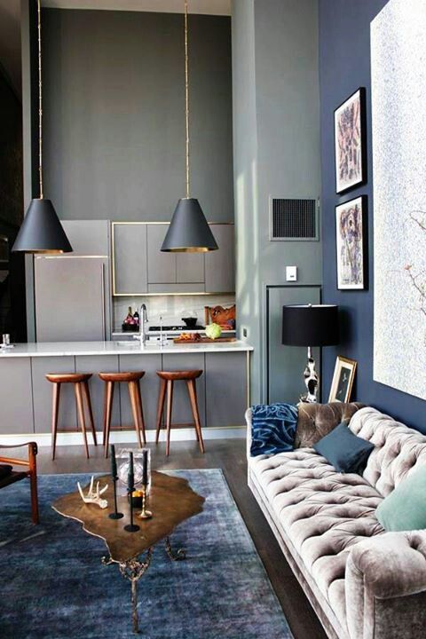 modern grey kitchen and a living room in greys, taupe and blues look edgy