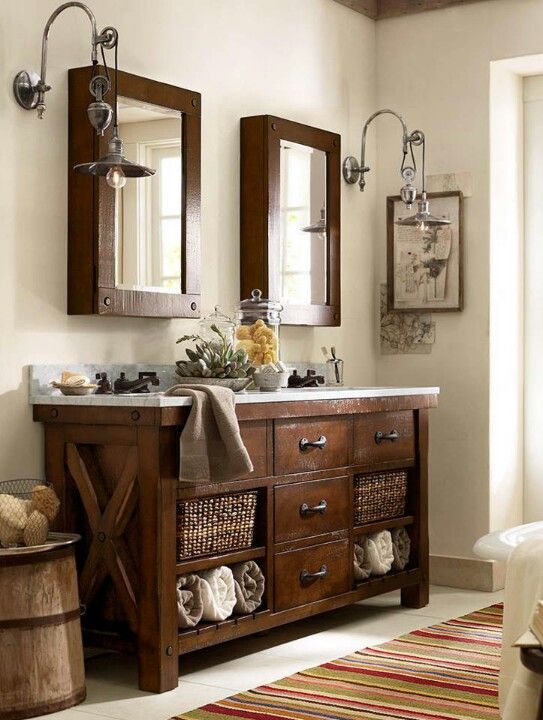 rustic industrial dark stained wood vanity with baskets and a contrasting top