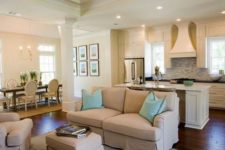 26 neutral kitchen in ivory and a tan living room to separate the zones