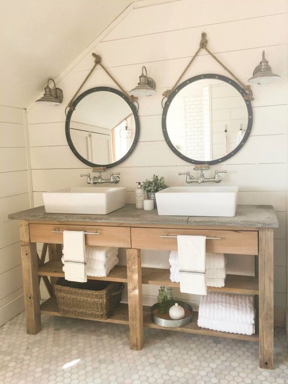 rustic bathroom vanity with open shelves and a reclaimed countertop