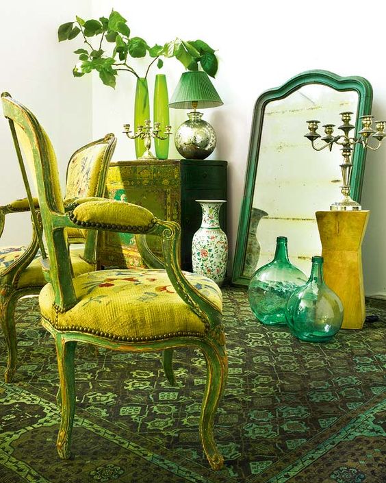 sage green carper and accessories, yellow upholstery and emerald touches