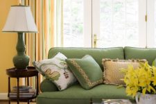 28 green upholstery and striped curtains with touches of orange, green and yellow