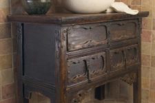 29 rustic vintage vanity of dark stained wood on tall legs