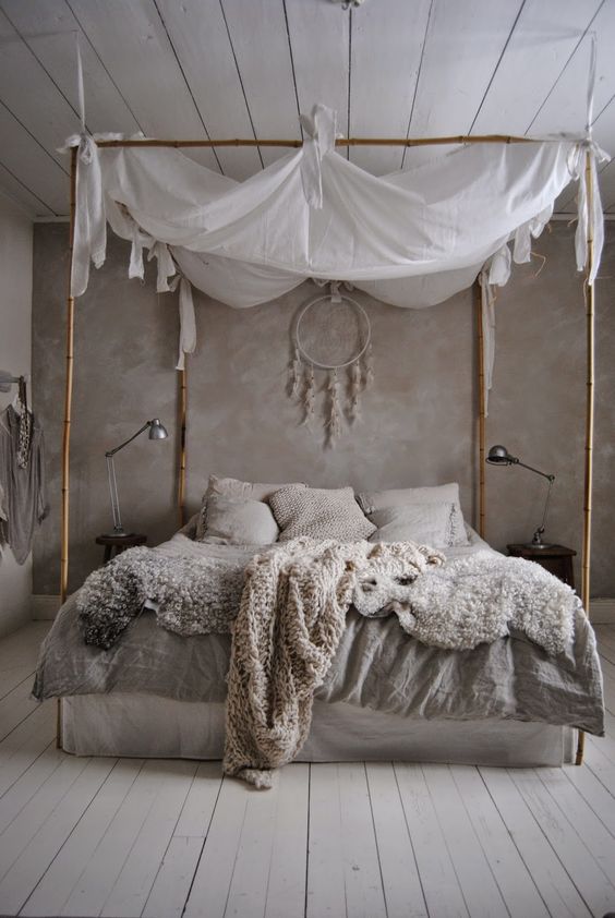 Scandinavian-inspired bedroom design with a bamboo frame bed and a canopy for peaceful sleep