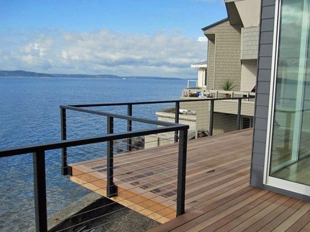 cable railing is ideal for houses with a view not to prevent you from seeing it anyhow
