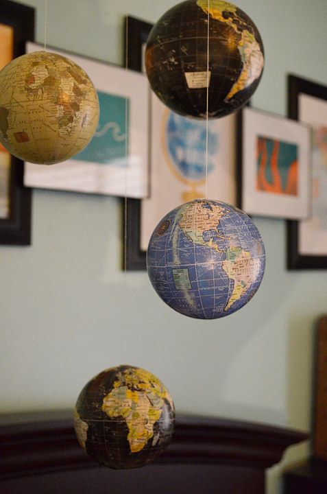 Hang globes in your nursery as a kid's mobile   it's a very inspiring idea