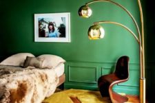 34 emerald walls and the ceiling and a yellow floor create a bold statement