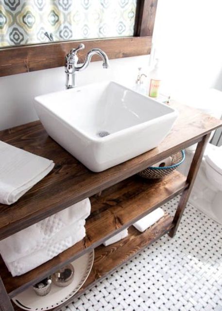 warm wood stained bathroom vanity with two open shelves