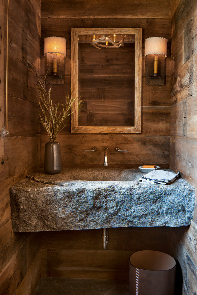 A stone slab vanity with an integreated sink definitely looks raw and industrial. (North Fork Builders of Montana, Inc.)