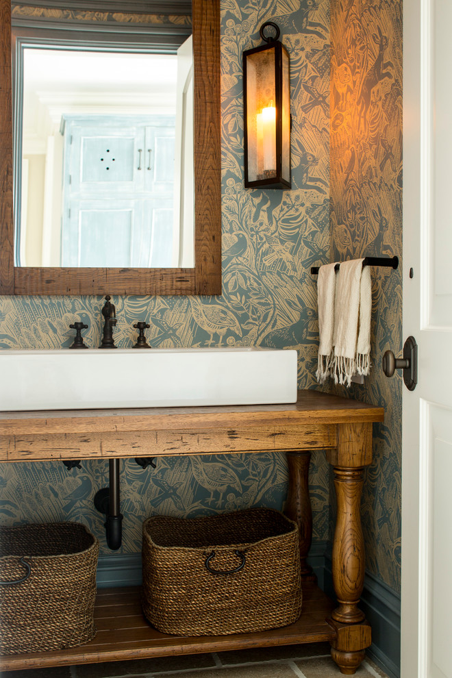 A repurposed vintage console table works well as a vanity. (ML Interior Designs)