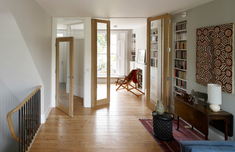 folding glass doors are used to separate two rooms where standard interior doors couldn't be used (Prewett Bizley ltd)