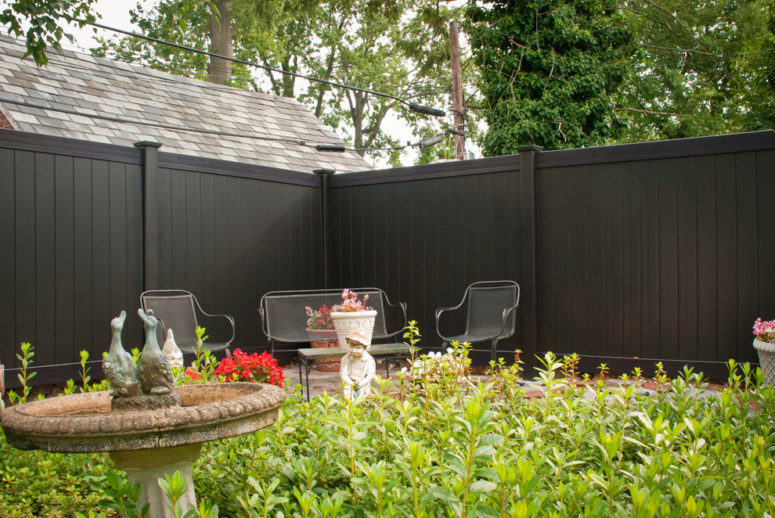 Black PVC vinyl privacy fence is perfect for those who like contemporary style. (Illusions Vinyl Fence)