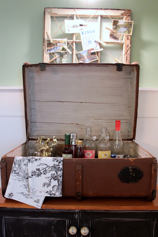 a small home bar could fit into a large vintage suitcase