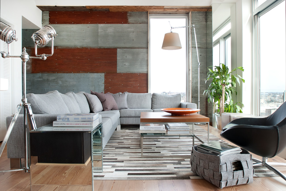 corrugated steel and rusted galvanised steel wall panels in a contemporary living room (Groundswell Design Group Inc.)