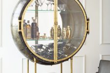 01 Porthole Bar is done in glamorized steampunk style, it combines glass, metal and pipes for a bold and eye-catchy look