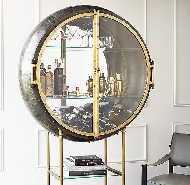 Porthole Bar is done in glamorized steampunk style, it combines glass, metal and pipes for a bold and eye catchy look