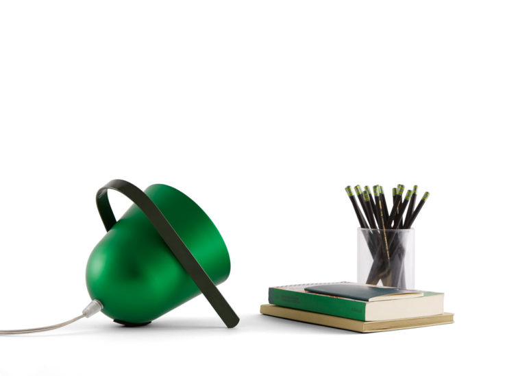 Elmetta portable table lamp is a perfect idea for a modern space, it's simple and creative
