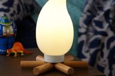 02 a campfire night light is perfect for a woodland or camping themed room
