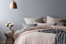 02 a girlish bedroom with a copper pendant lamp that completes the color scheme in a perfect way