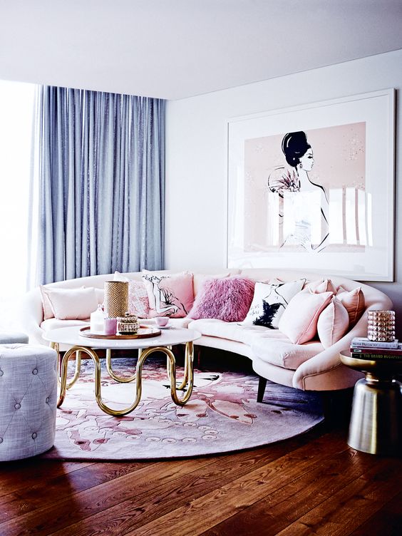 a rounded blush sofa with graphic and pink fur pillows is a great idea for a girlish space