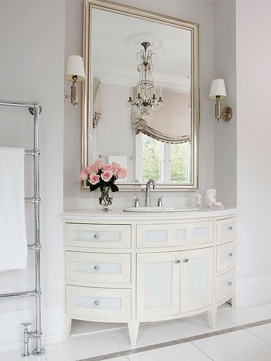 elegant rounded bathroom vanity with lots of storage inside