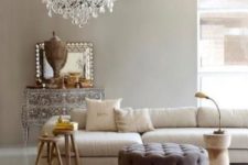03 French style living room with a modern twist and a vintage glam chandelier for a refined feel