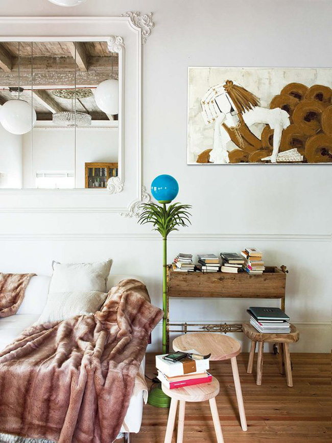 Molding make the room refined, and warm-colored woods make it cozier